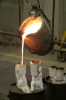 pouring bronze in the sculpture labs